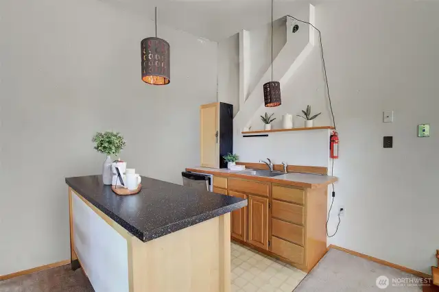 Kitchen area (end wall is virtually enhanced).