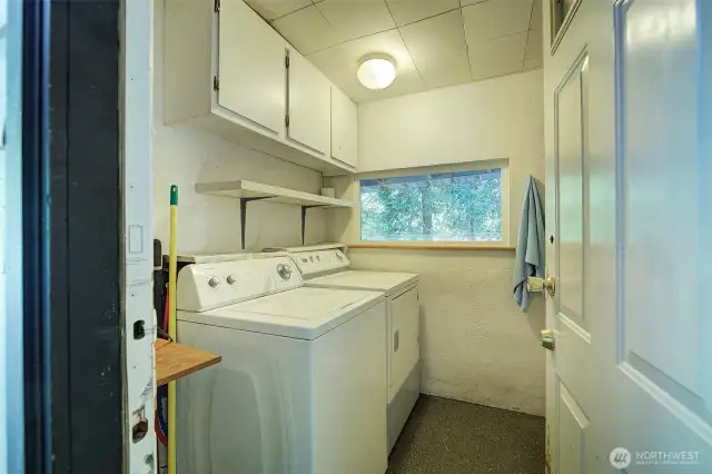 Laundry area is on the back porch of the house