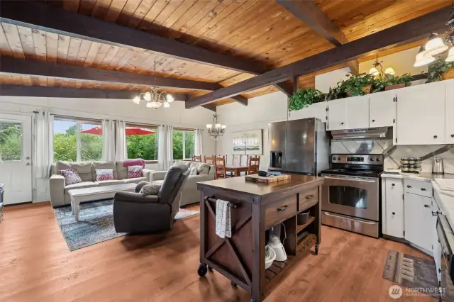 Beautiful exposed beams truly set the mood throughout the house