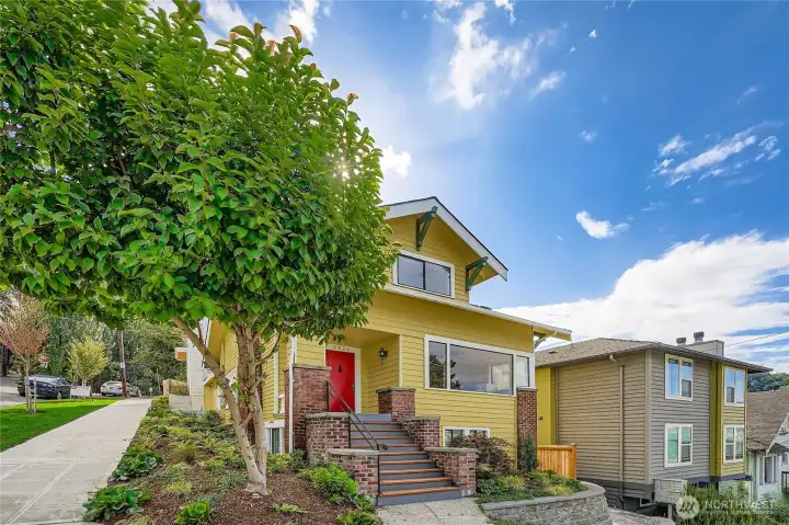 Corner lot with City views to the South and Lake Union to the West.