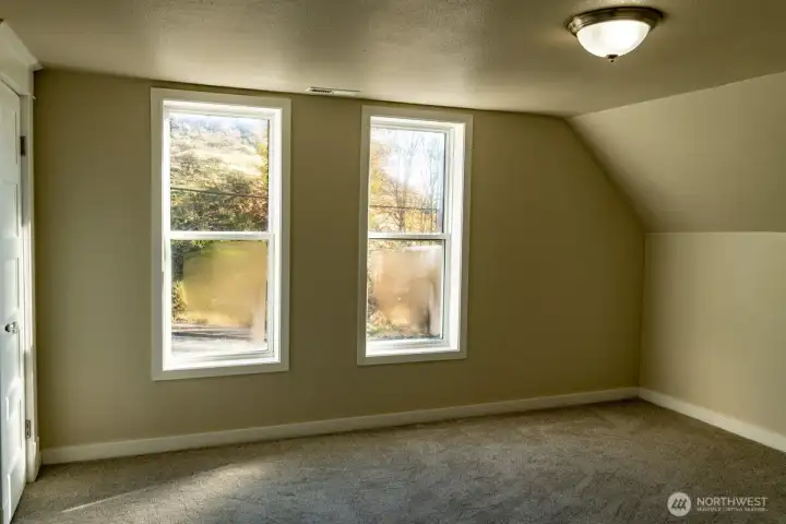 Primary bedroom with 2 windows