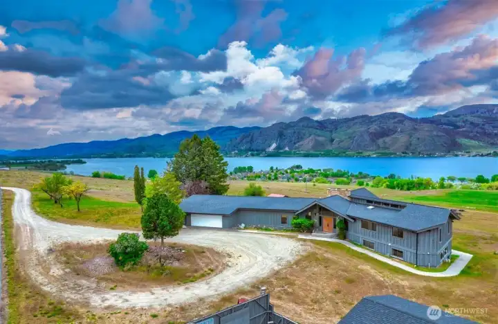 Custom Northwest Mid-Century style home with panoramic Lake Osoyoos, mountain and territorial views