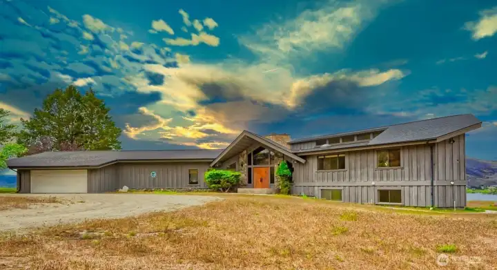 Timeless architectural style with expansive views, double car attached garage and detached garage/shop