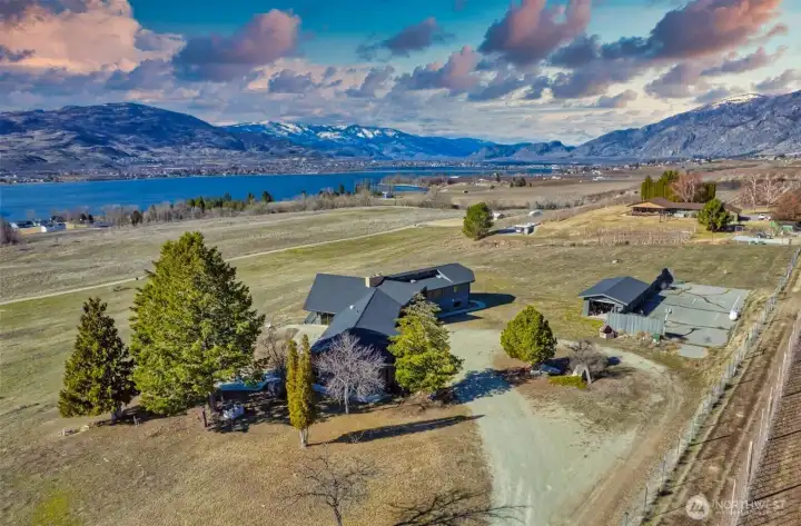 Sweeping views of Lake Osoyoos towards Osoyoos, BC with mountain backdrops