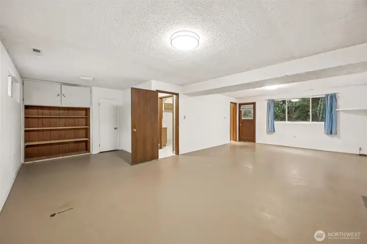 Spacious lower level with separate entrance, three-quarter bath, and kitchen area. Adds flexibility and opens the door to a variety of possibilities.