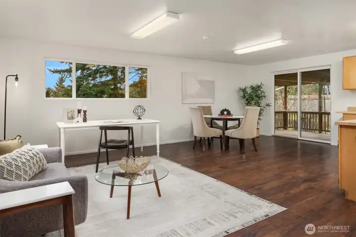 Lower level opens to covered deck - wonderful for year-round outdoor enjoyment.