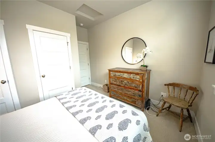 Two closets, one with a lock can be used as an owner closet.