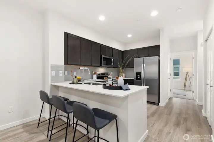 Breakfast bar offers additional seating.