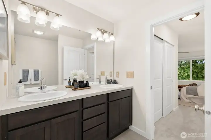 Primary ensuite offers dual vanities and great storage.
