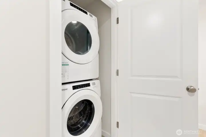 Laundry closet in upper level hallway.