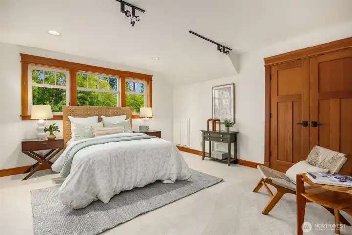 One of three upper-level bedrooms.