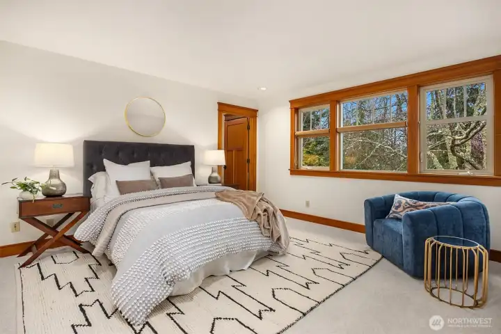 One of three upper-level bedrooms.