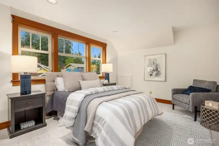 One of three upper-level bedrooms.