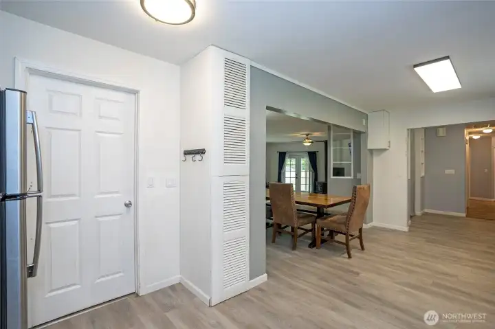 Utility room is located through the door on the left and provides access to an exterior door leading directly to the BBQ gazebo just outside.