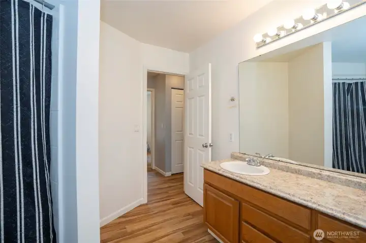 Another view of the spacious guest bath.