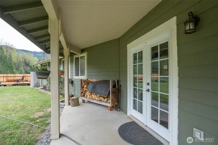 French doors open into the inviting living area, enhancing natural light and flow throughout the home.