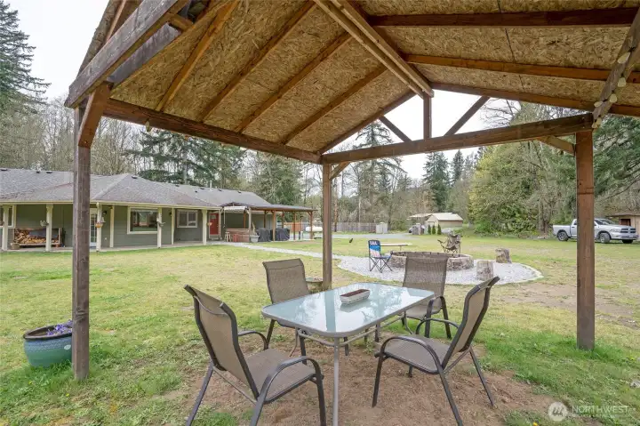 Second gazebo provides additional covered space for outdoor entertaining and gatherings.