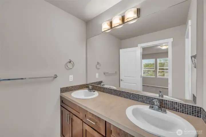 All new paint inside the home. The primary bedroom has a full bath with a double sink vanity.