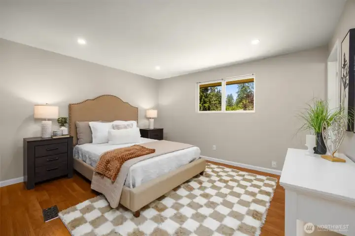 Gorgeous master bedroom with attached bathroom and closets with custom cabinets
