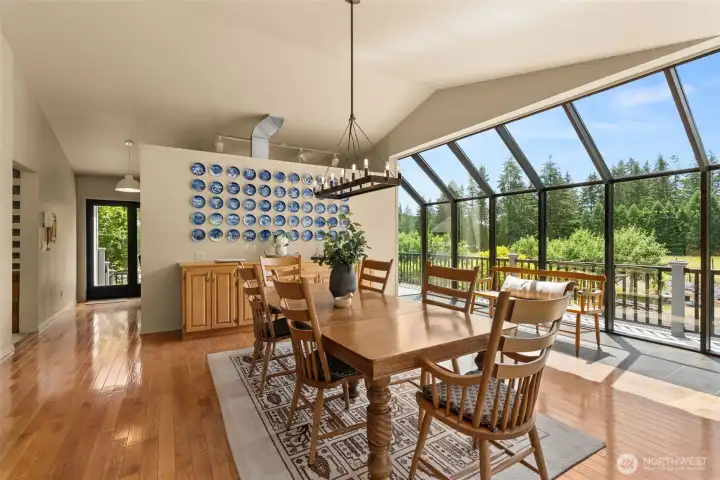 Dining room with solarium windows. Dining room with solarium windows.