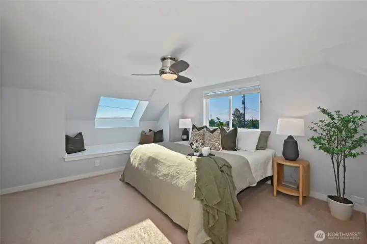 With ceiling fan and charming bench seating.