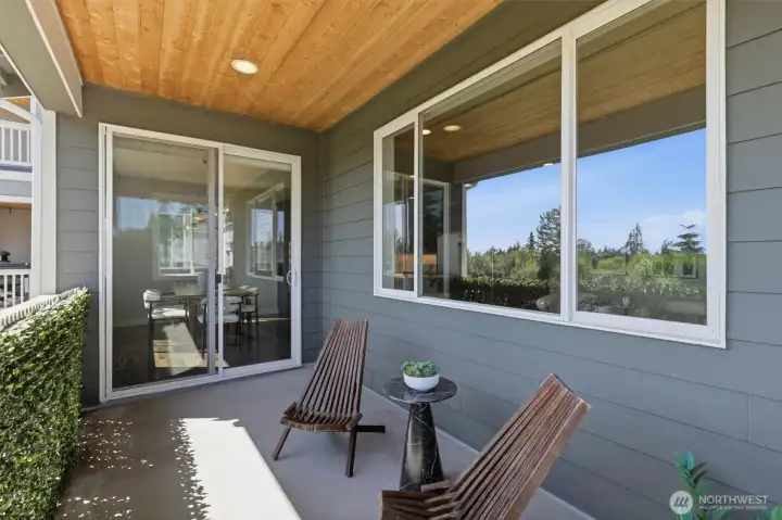 Covered outdoor living space perfect for year-round enjoyment.
