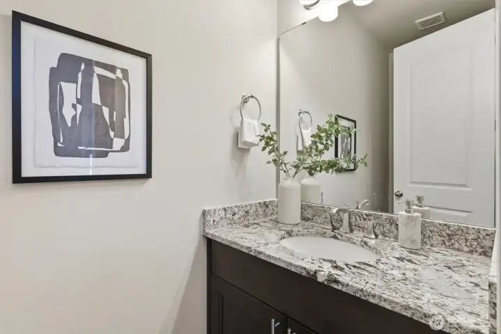 Elegant main-level bathroom.