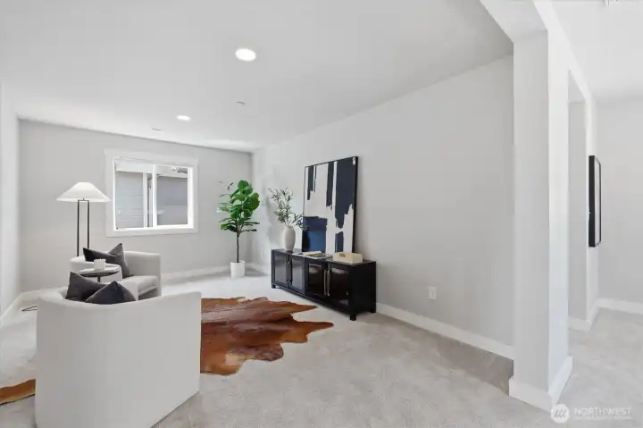 Spacious upstairs bonus loft—ideal as a media room, playroom, or home office.