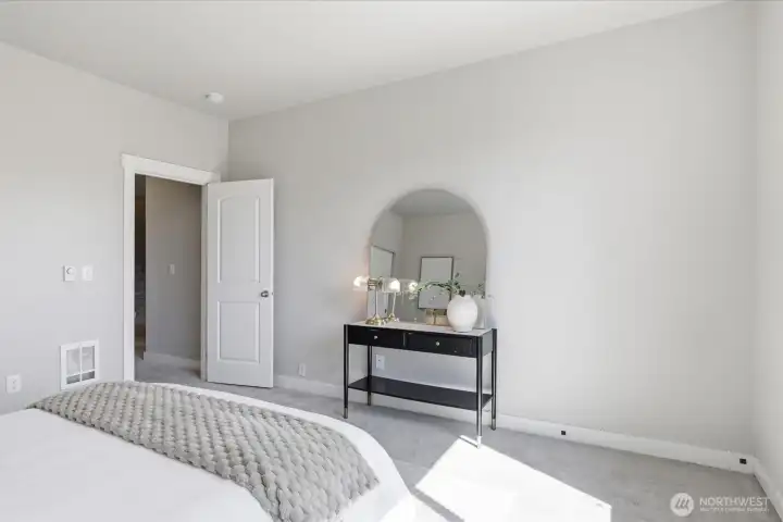 Additional bedroom offering flexible living options.