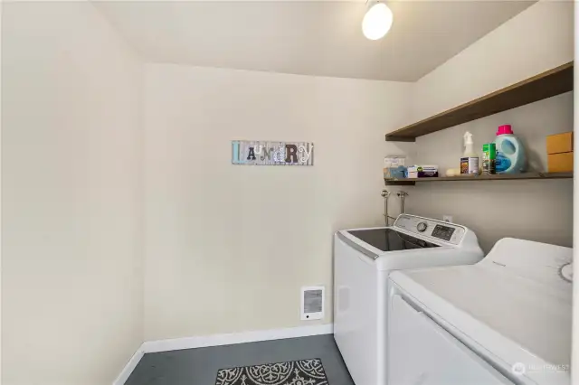 Neat and tidy shared laundry area.