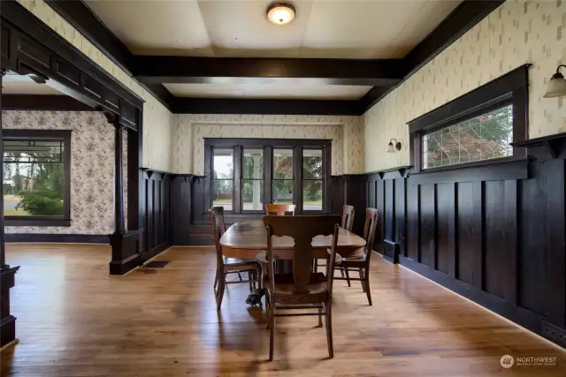 Elegant dining room with original wood work and built ins