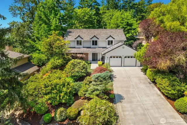 Newer driveway leads to the roomy 2 car garage - plenty of parking for extra guests