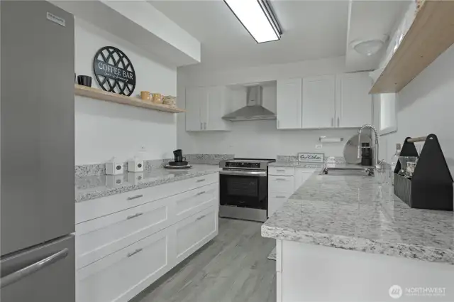 All new kitchen and appliances with soft close cabinets and Quartz countertops.