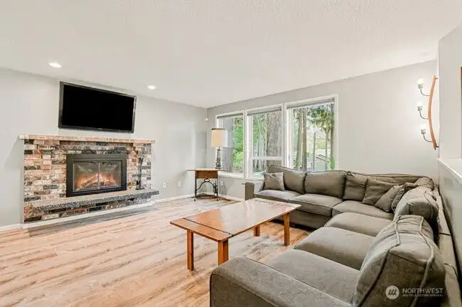 Wood burning fireplace on both levels.