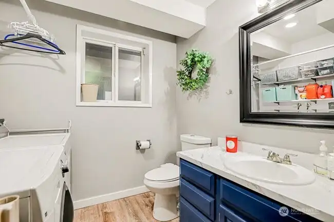 Basement utility room and 1/2 bath