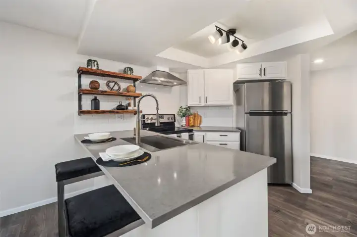 Updated modern kitchen with new appliances.