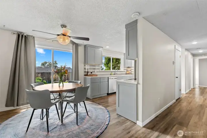 Kitchen dining area with sliding door to the back porch and beautiful views!