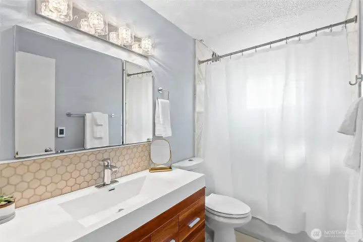 Bathroom is well-appointed with heated floors for modern-day comfort!