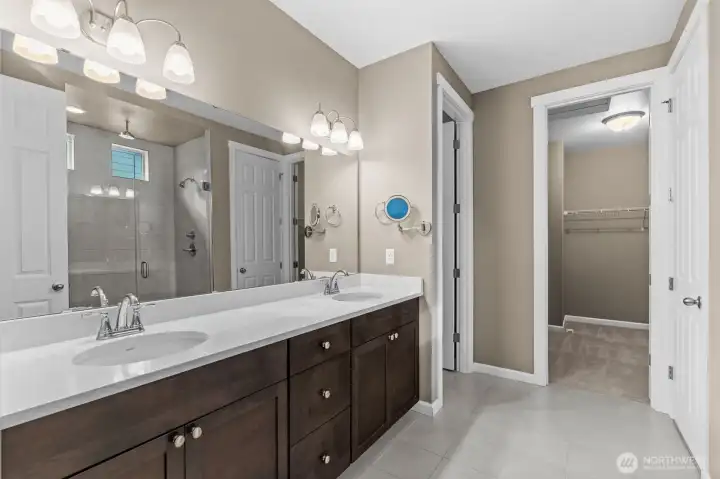 Primary bath with double sinks and quartz countertops