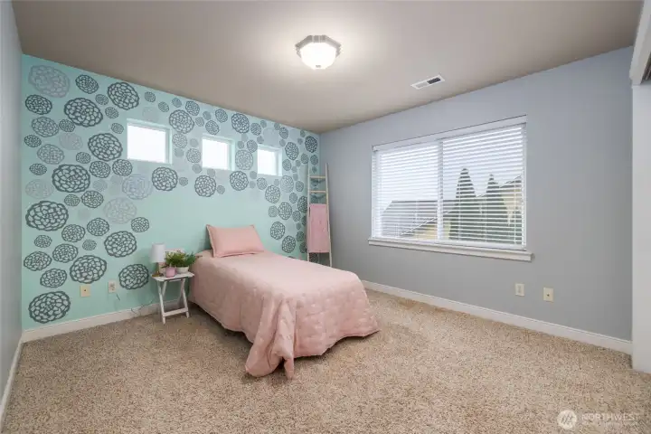 One of two oversized guest bedrooms upstairs.