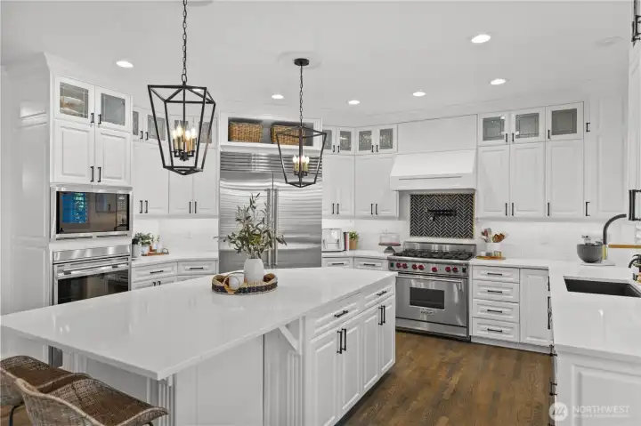 High end chef's kitchen with sub-zero fridge and Wolf appliances are a dream set up.