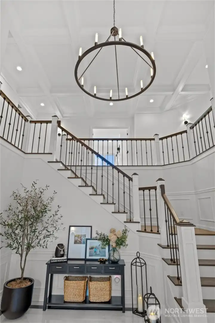 Coffered ceilings with custom lighting will take your breath away.
