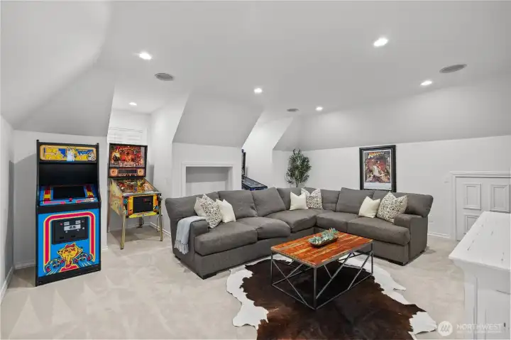 Upstairs bonus room is a large gathering space or could be used as a 5th bedroom. Lots of natural light and flexibility with this space with a full bathroom.