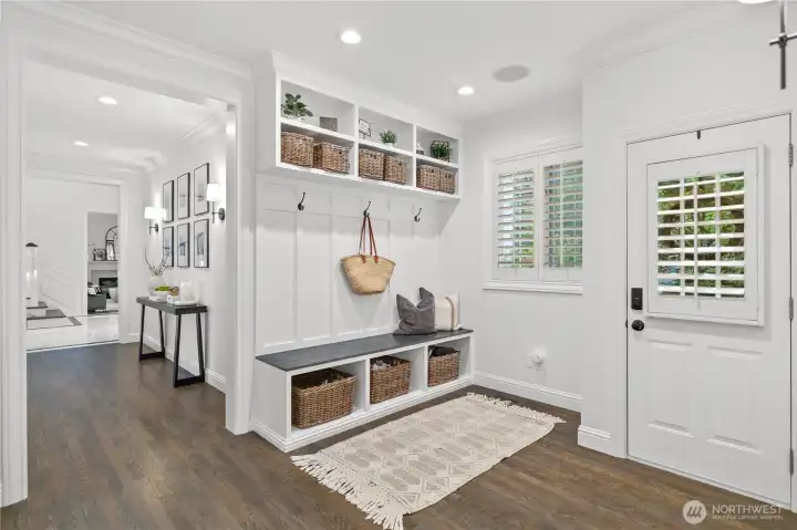 Mud room has entrance to front of house and is just off of attached 3 car garage. Flows perfectly into laundry room.