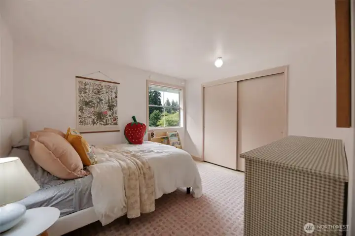 Spacious bedroom #2, overlooking the backyard