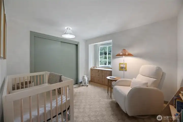 Bedroom #3, with a dormer nook overlooking the front yard