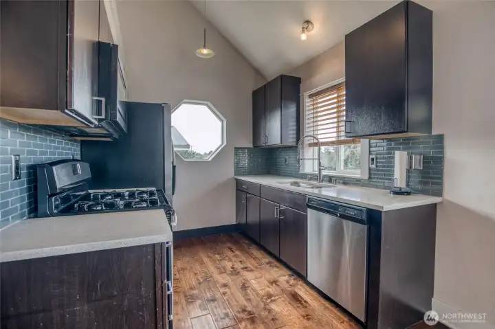 Gally kitchen with lots of storage.