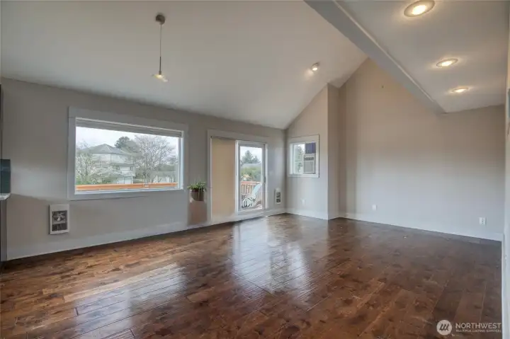 Spacious second level living area with access to the large deck for outdoor entertaining.