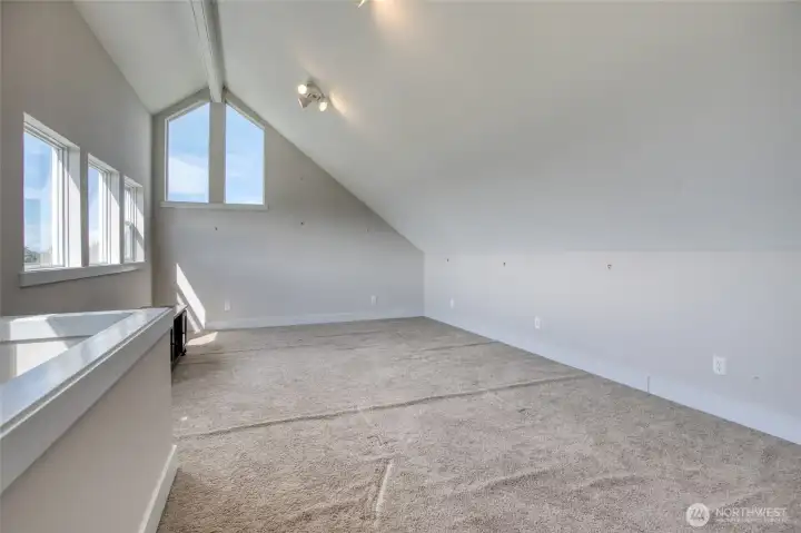 The top level is perfect for a study, recreation room or just relaxing with ocean view windows!