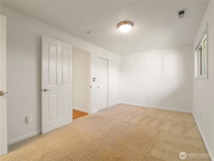Primary room lets in lots of natural light